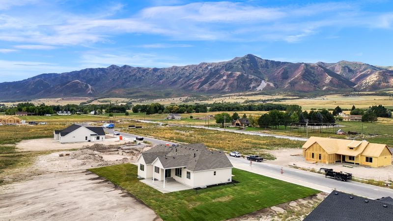 Aerial view looking across the neighbourhood to the mountain range