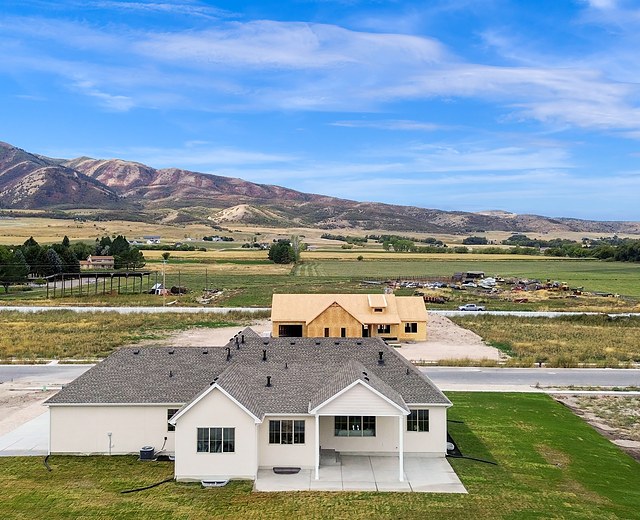 Covered back porch with the Wellsville Mountains behind, 993 N 75 W, Mendon