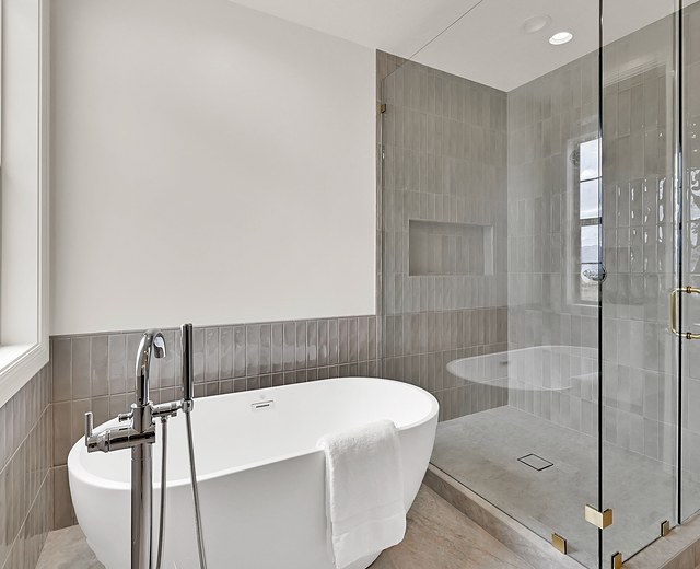 Primary bath with a freestanding soaking tub and fully tiled walk-in shower, 993 N 75 W, Mendon