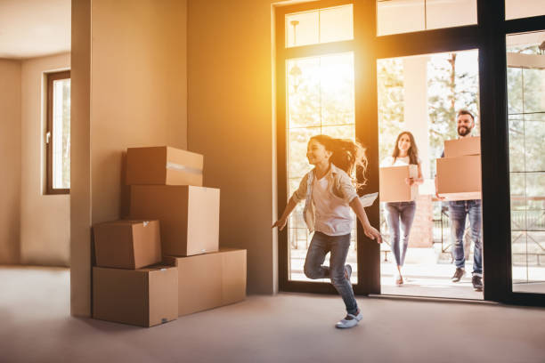 A family moving into their new home